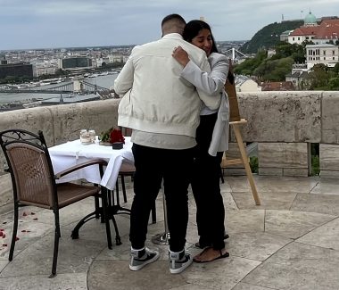 Couple hugging after engagement